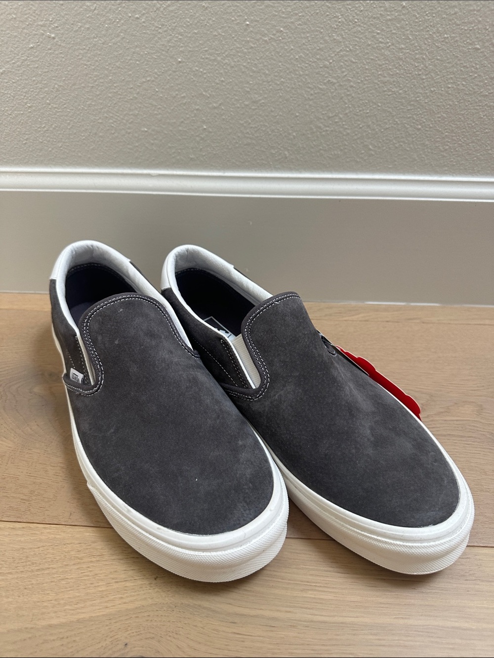 Vans Slip-On Suede Sneakers in Charcoal and White